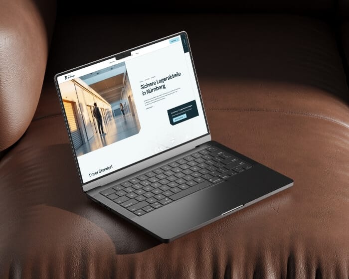 Laptop mock-up showcasing clean self storage website design hero section