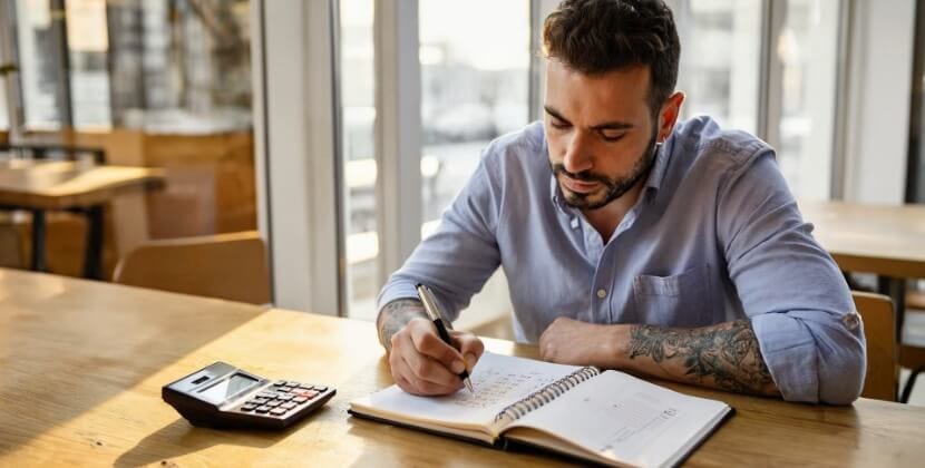 Consultant calculating web design cost versus investment with clear ecommerce website cost benefit and rising web design ROI.
