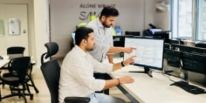 security and speed optimisation: engineers reviewing security events and malware prevention logs