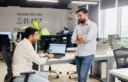 security and speed optimisation: team reviewing security and performance overview in a bright office