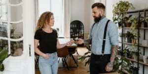 Smooth domain transfer handoff with security key, calm team setting.