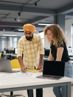 two team members, people behind our web design pricing.