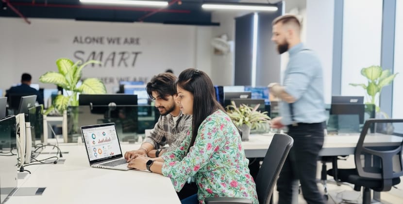 Team reviewing Core Web Vitals during a site performance comparison in a modern office
