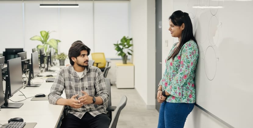 Colleagues discussing what Core Web Vitals measure using a simple visual setup