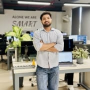 enterprise web development agency automating delivery, CI workflow concept with tokens on a conveyor track