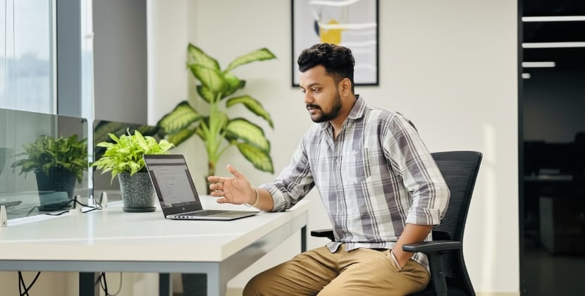 Specialist managing local SEO checklist review tasks in a relaxed office scene