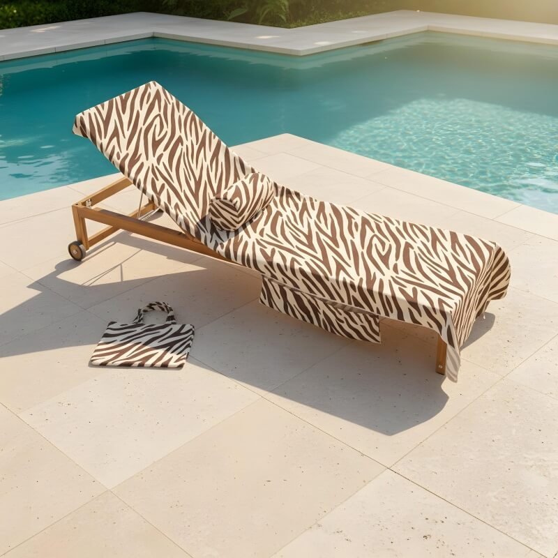 AI lifestyle product photography of zebra print sun lounger styled beside a luxury pool