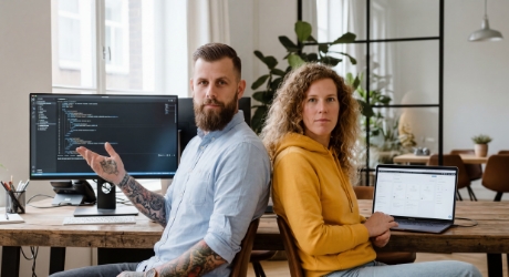 custom WordPress theme code editor versus Elementor page builder interface on split screen