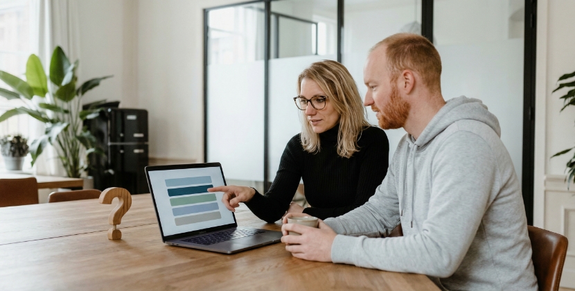FAQ layout on a website editor screen, five questions listed, blurred text, neutral background