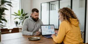 Paid social advertising setup at a social media marketing agency, building campaign layouts for social media marketing services