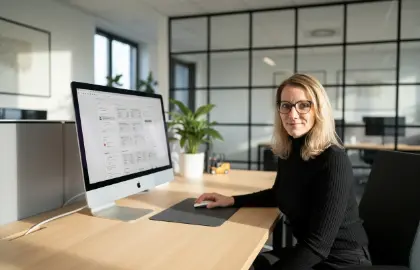 Studio Ubique team member at an online store dashboard in the Zwolle office, eCommerce development