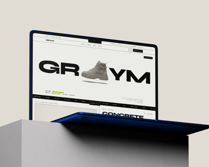 GRYM, een mode webshop laten maken als concept, homepage op een laptop