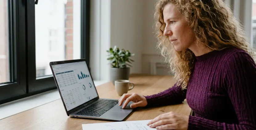 Marketer calmly reviewing product page health and add-to-cart data on a clean screen
